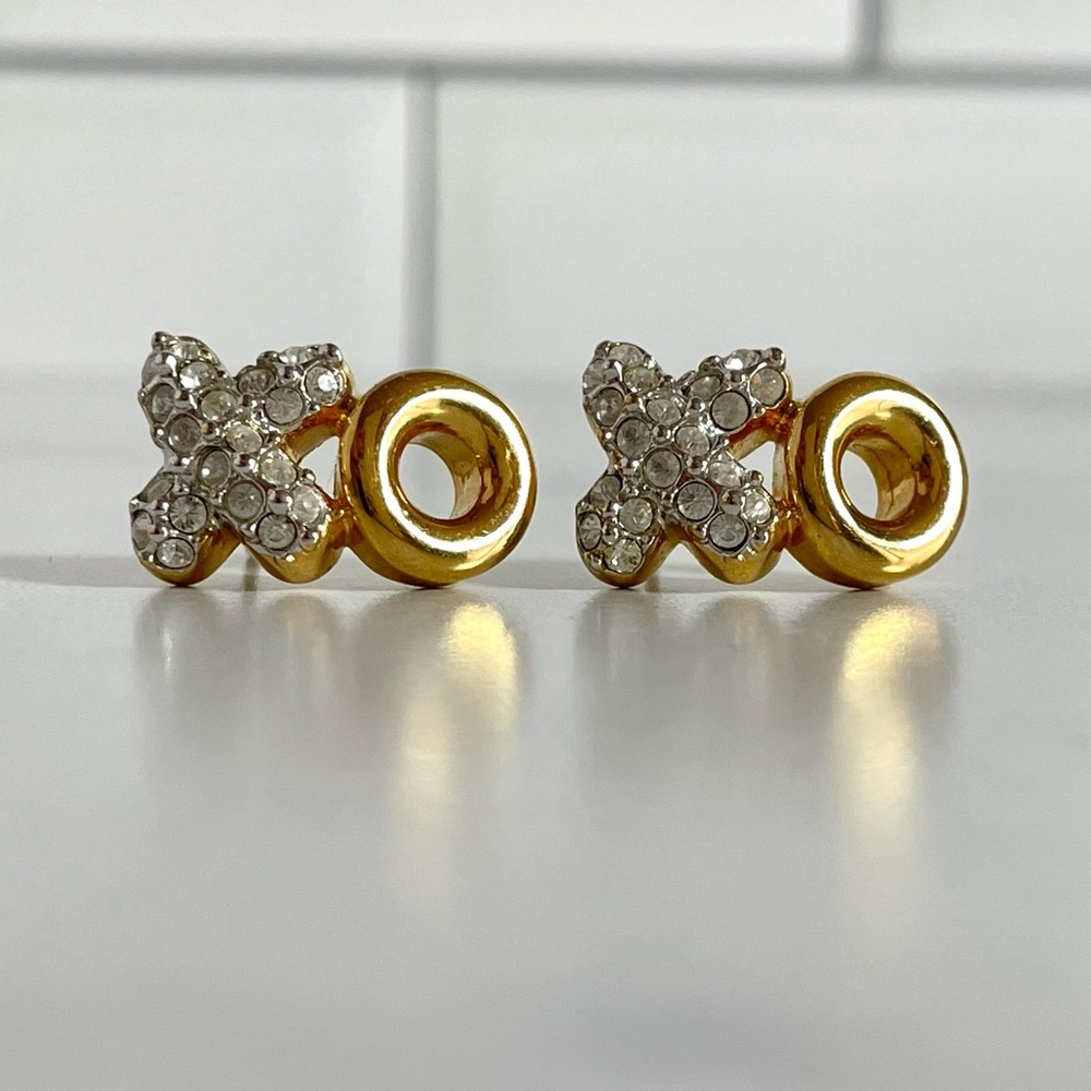 Cute XO crystal and gold tone earrings.